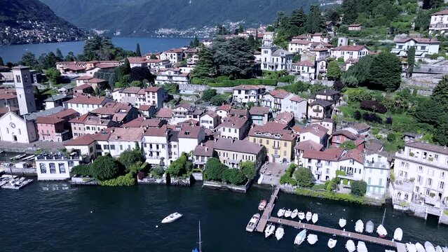 cinematic aerial shot about a typical Italian town on Como lake called Torno famous for its gardens and little romantic streets 4