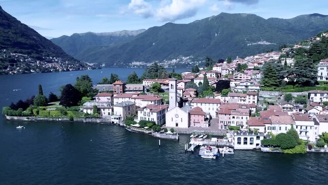 cinematic aerial shot about a typical Italian town on Como lake called Torno famous for its gardens and little romantic streets 2