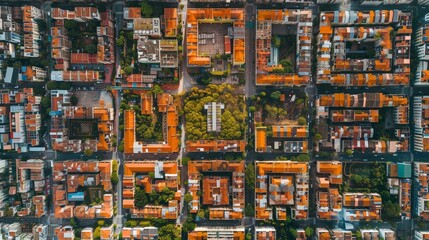 Top view of urban planners using pollution data and analytics software to create sustainable city design plans in a municipal office setting.