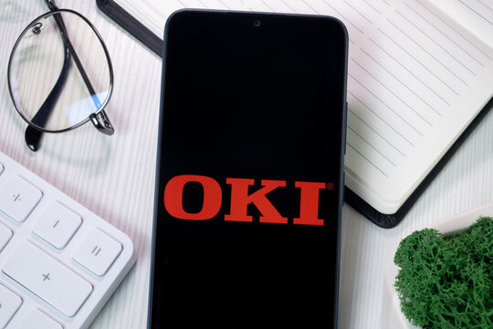 New York, USA - 21 June 2024: OKI Logo on Phone Screen, Company Icon