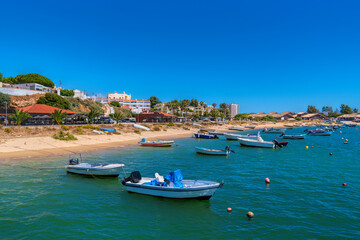 The Algarve Portugal beautiful coast town of Alvor with boats and blue sea and sky