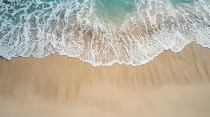 Obraz premium photo of the beach. sand and water, top view.
