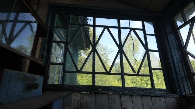 old wooden window in an abandoned village house