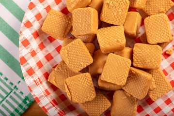 Plate with milk dices for Festa Junina in Brazil, top view.
