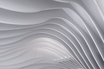 Naklejka premium Modern Background of wavy lines and geometric shapes on white colors wall interior and exterior building decoration. Abstract texture white wave pattern. Beautiful simple radial pattern.
