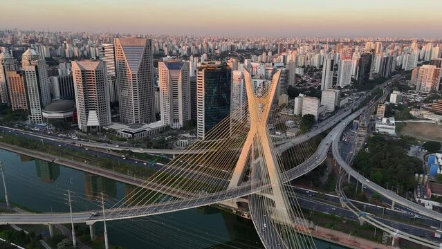 Aerial view of Oct&aacute;vio Frias de Oliveira Bridge, a landmark of S&atilde;o Paulo, during sunset - S&atilde;o Paulo, Brazil