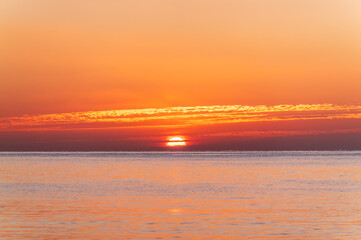 Beautiful red and orange sunrise over the sea.