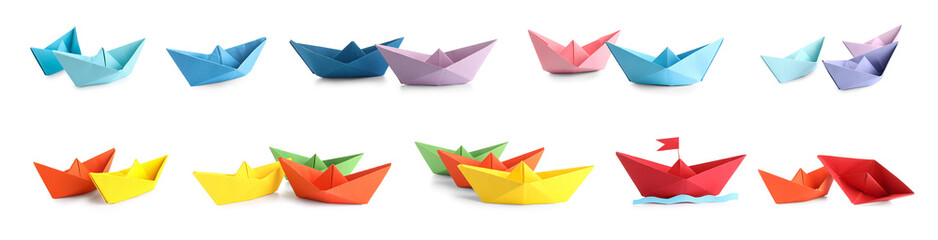 Set of origami boats on white background