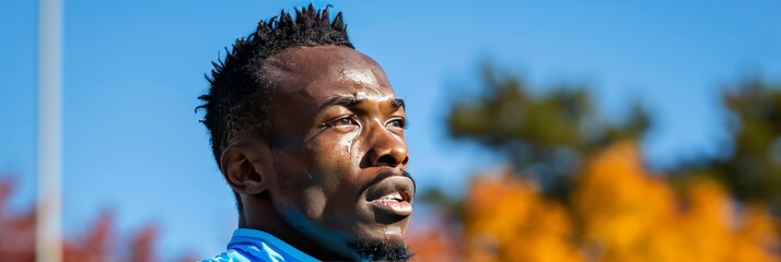 Intense close up of runner showing strain and determination during a challenging race