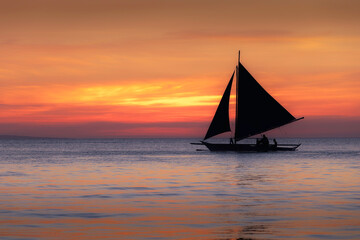 sailboat at sunset