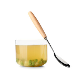 Bowl of tasty vegetable broth on white background