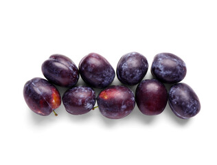 Ripe plums on white background
