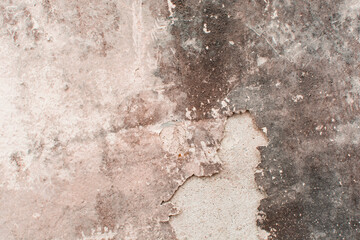 Old peeling paint on walls, painted walls damaged from dampness and aging, textured old wall background