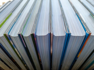 Perspective of aligned hardcover book sheets