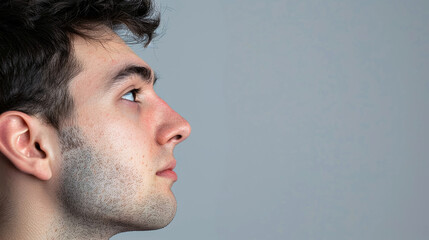 Fototapeta premium Side shot of man with concentrated face.