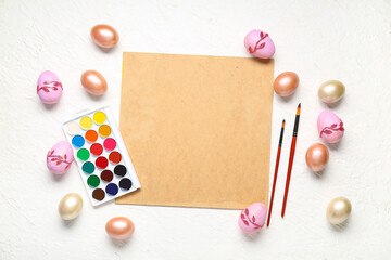 Beautiful Easter composition with eggs and blank card on white background