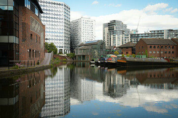 Fototapeta premium Reflections of buildings on the water