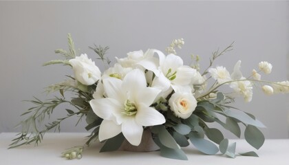 Elegant flower arrangement, bouquet with white lilies and white roses