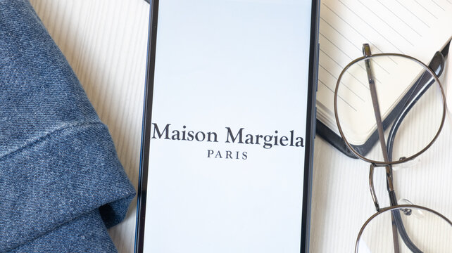 New York, USA - 21 June 2024: Maison Margiela Logo on Phone Screen, Company Icon