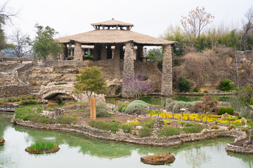Japanese Tea Garden park featuring stone bridges, kio pond and pagoda, San Antonio Texas.  Landscape travel image
