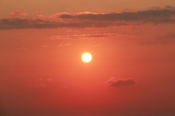 Obraz premium Sunrise on a sunny day with orange sky clouds