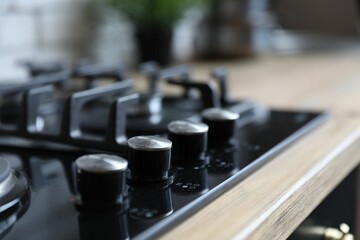 Obraz premium New modern stove, closeup view. Kitchen appliance