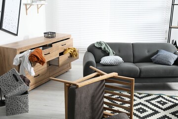 View on messy living room interior after robbery