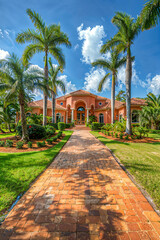 Spanish style mansion in Florida, exterior luxury home design, vertical