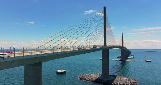 Cars driving on Sunshine Skyway Bridge over Tampa Bay in Florida. Transportation infrastructure in America