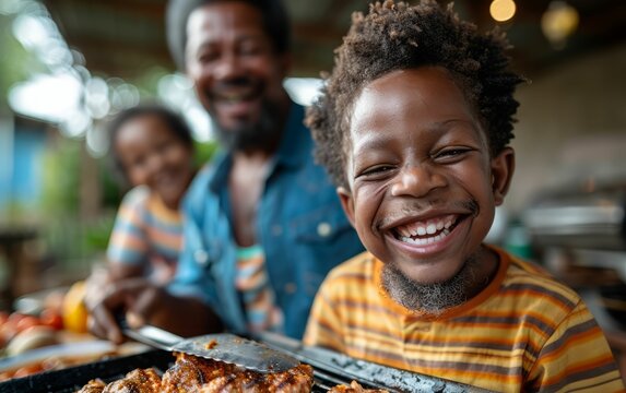 An adult with a boyish figure is enjoying a barbecue with his family.