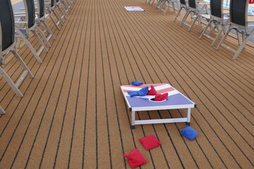 Red, white and blue corn hole game with bags