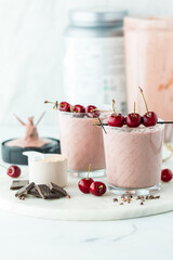Cherry chocolate protein smoothies, ready for drinking.
