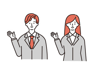 スーツ姿で案内をする若い男女