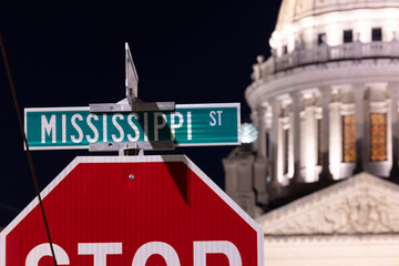 Jackson, Mississippi, USA - April 23, 2024: Artificial night light shines on the Mississippi Street...