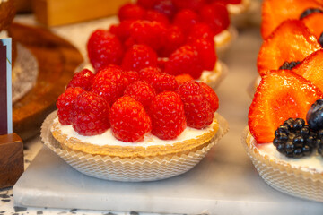 Sweet cake red fruits and berries framboise tartlets with cream