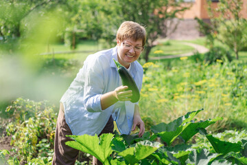 Senior woman is gardening on beautiful sunny day