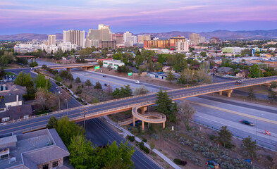 Bridge crossing the Interstate 80 and downtown Reno at sunrise, Nevada, United State of America.