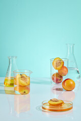 The promotional photo was shot from front angle on blue texture, peach in experiment. Cosmetic or beauty care product advertising pic with displaying and copy space