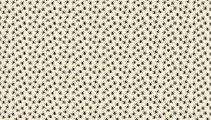 Fototapeta premium A black spider pattern on light brown background