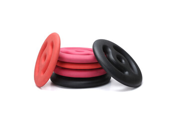 neoprene rubber coated colorful gym wieght plates isolated on white background