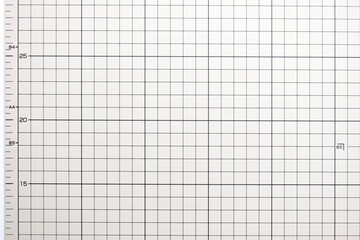 gray cutting mat board background with line and scale measure guide pattern for object art design, tool equipment of diy craft work