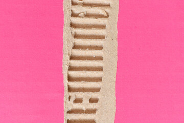 tear pink cardboard box texture background, recycle material