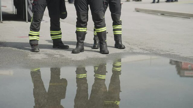 A specialized firefighting unit equipped with special attire and advanced equipment embarks on a hazardous fire suppression mission, showcasing their professionalism and readiness to combat fires in