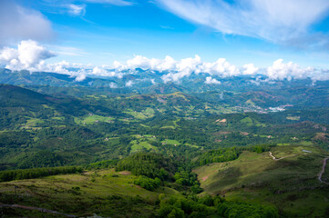 Fototapeta premium Travelling by old wooden train up to Larrun or La Rhune, Larhune mountain at the western end of the Pyrenees located on border of France and Spain, in traditional Basque provinces Labourd and Navarra