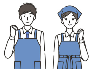 ガッツポーズの店員の男性と女性