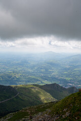 Fototapeta premium Travelling by old wooden train up to Larrun or La Rhune, Larhune mountain at the western end of the Pyrenees located on border of France and Spain, in traditional Basque provinces Labourd and Navarra