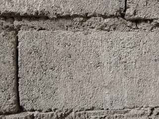 Wall surface texture is rough. The texture of the building walls is rough.  
