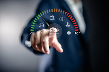 Businesswoman analyzing risk and opportunities to planning business via risk level indicator...