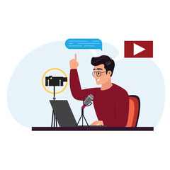 Man with glasses is seated at a desk, actively streaming or recording content