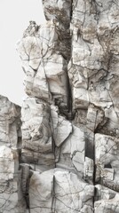 Fototapeta premium Close-up view of cracked rocky cliffside with layers and textures